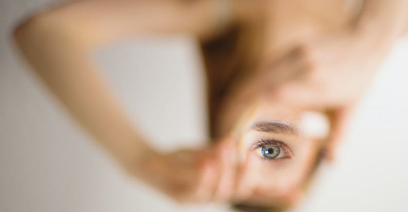 Visual Aids - Photo of Woman in Upside Down Position with Focus on the Eye