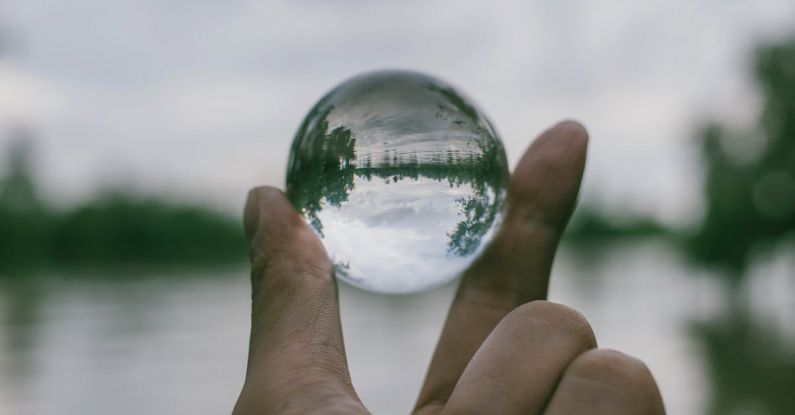 Transparency - Close-Up Photography of Person Holding Crystal Ball
