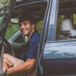 Uber - Man Inside Vehicle in Front of Opened Door