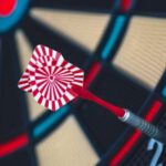 Business Goals - Red and White Dart on Darts Board