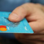 Debt Financing - Person Holding Debit Card