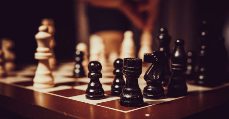 Strategic Planning - Black and White Chess Pieces on Chess Board