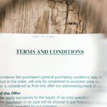 Legal Agreements - Selective Focus Photo of Terms and Conditions Written on a Paper