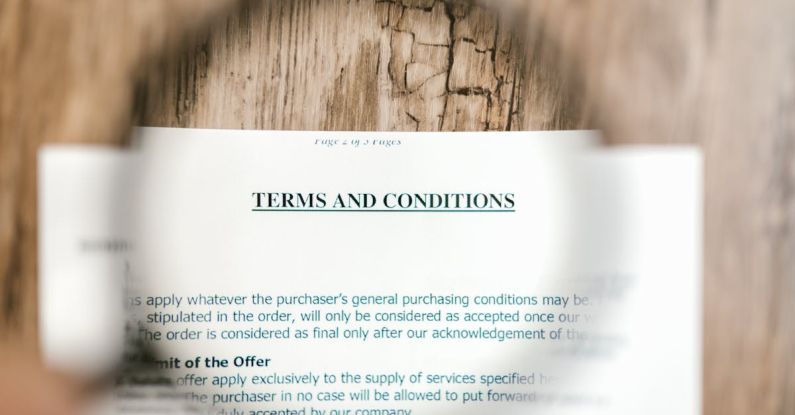 Legal Agreements - Selective Focus Photo of Terms and Conditions Written on a Paper