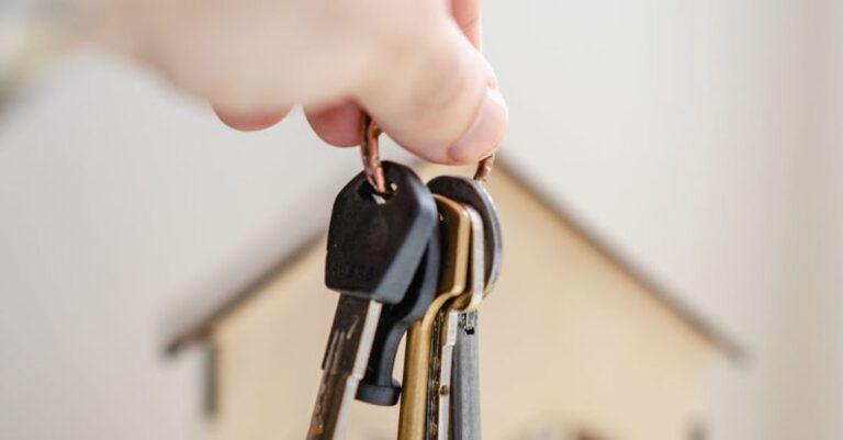 Legal Obligations - Person with keys for real estate